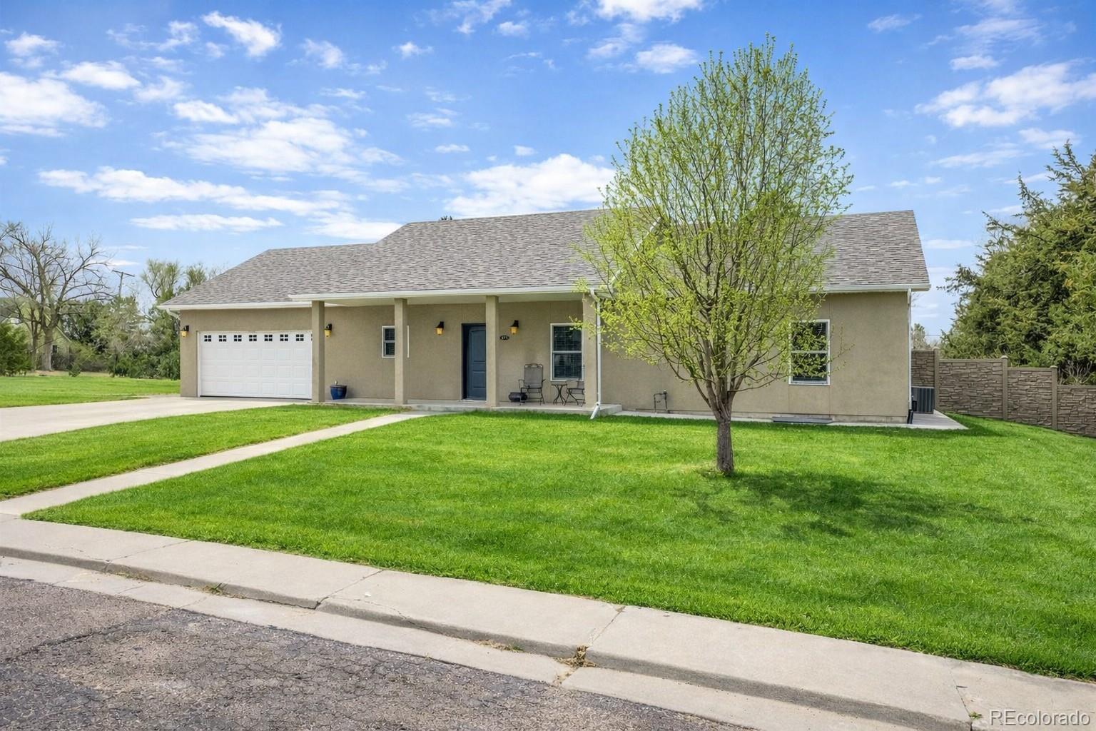 675 9th Street Limon, CO 80828 - Photo 1 of 49 a view of a house with a yard