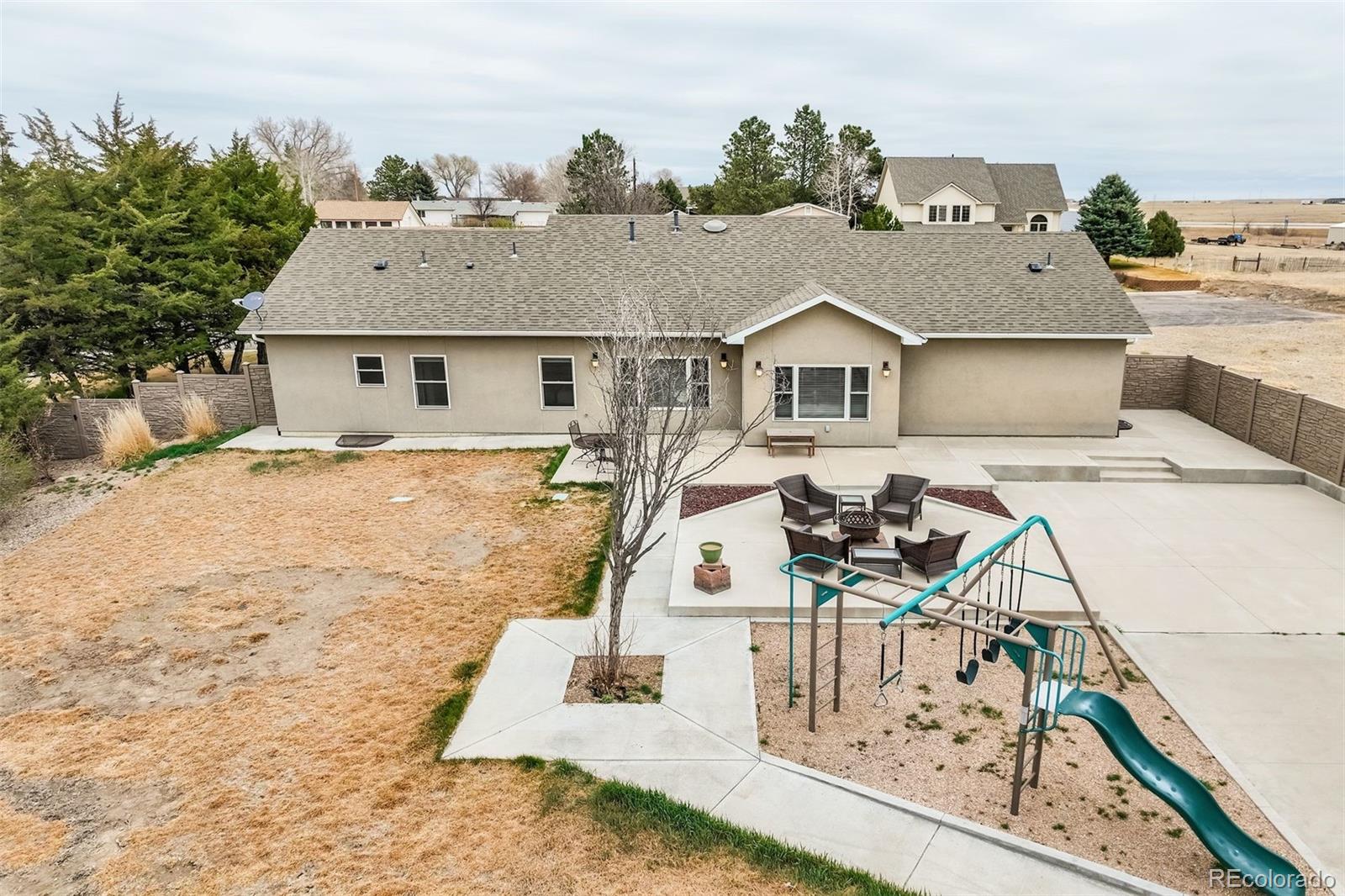 675 9th Street Limon, CO 80828 - Photo 13 of 49 a view of a house with wooden fence