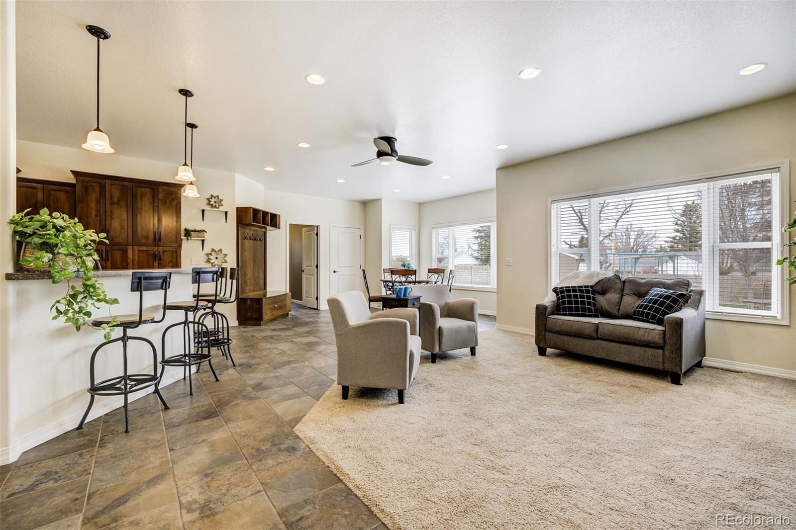675 9th Street Limon, CO 80828 - Photo 17 of 49 a living room with furniture and a large window