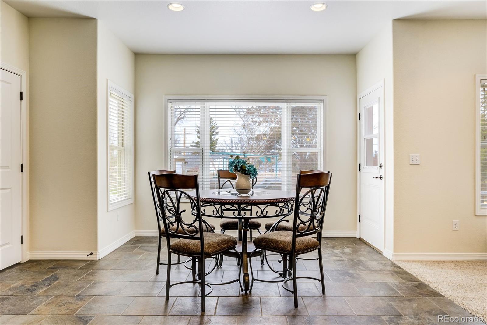 675 9th Street Limon, CO 80828 - Photo 18 of 49 a view of a dining room with furniture window and outside view