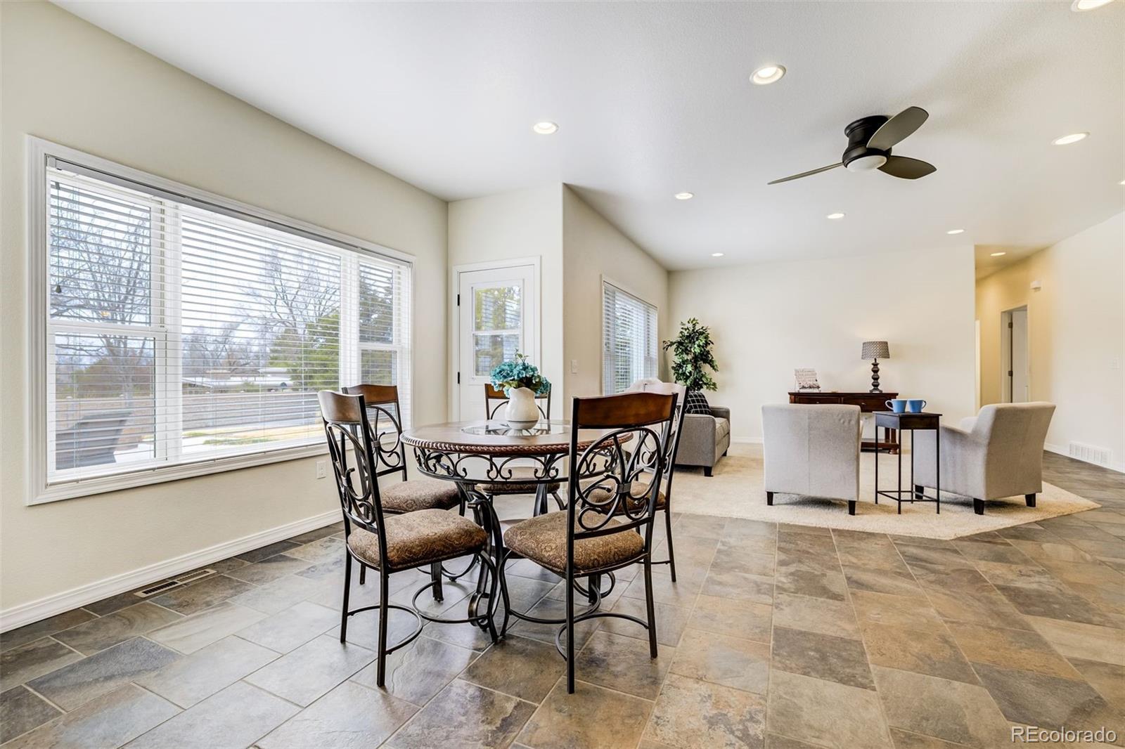 675 9th Street Limon, CO 80828 - Photo 19 of 49 a view of a dining room with furniture and a large window