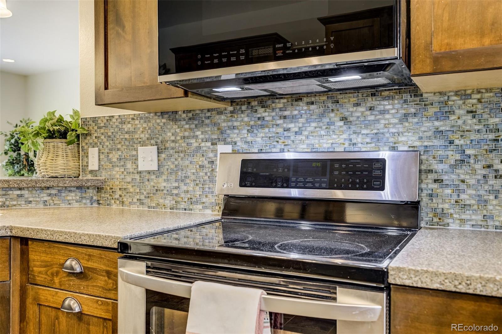 675 9th Street Limon, CO 80828 - Photo 25 of 49 a stove top oven sitting inside of a kitchen
