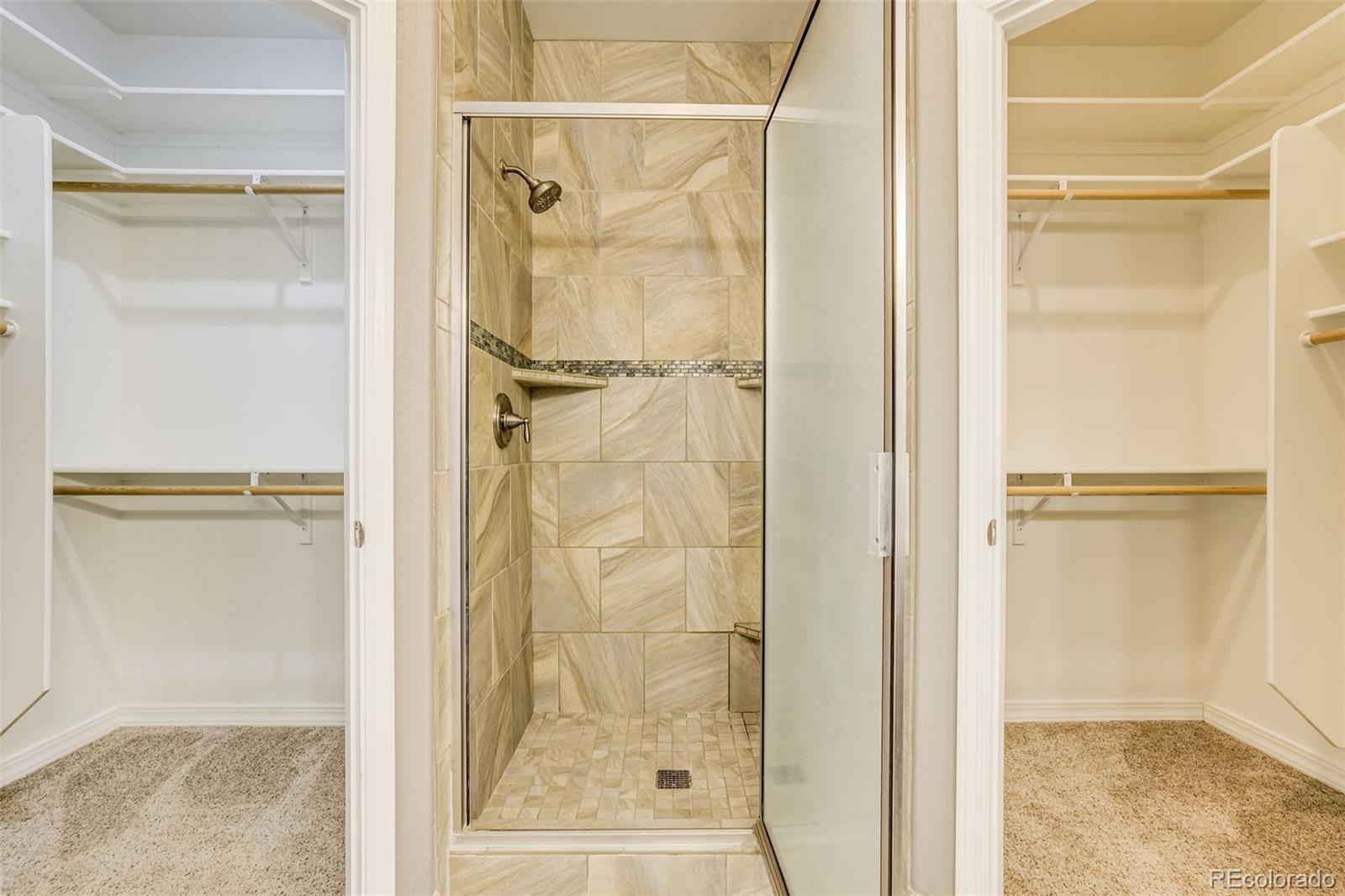 675 9th Street Limon, CO 80828 - Photo 32 of 49 a bathroom with a glass shower door