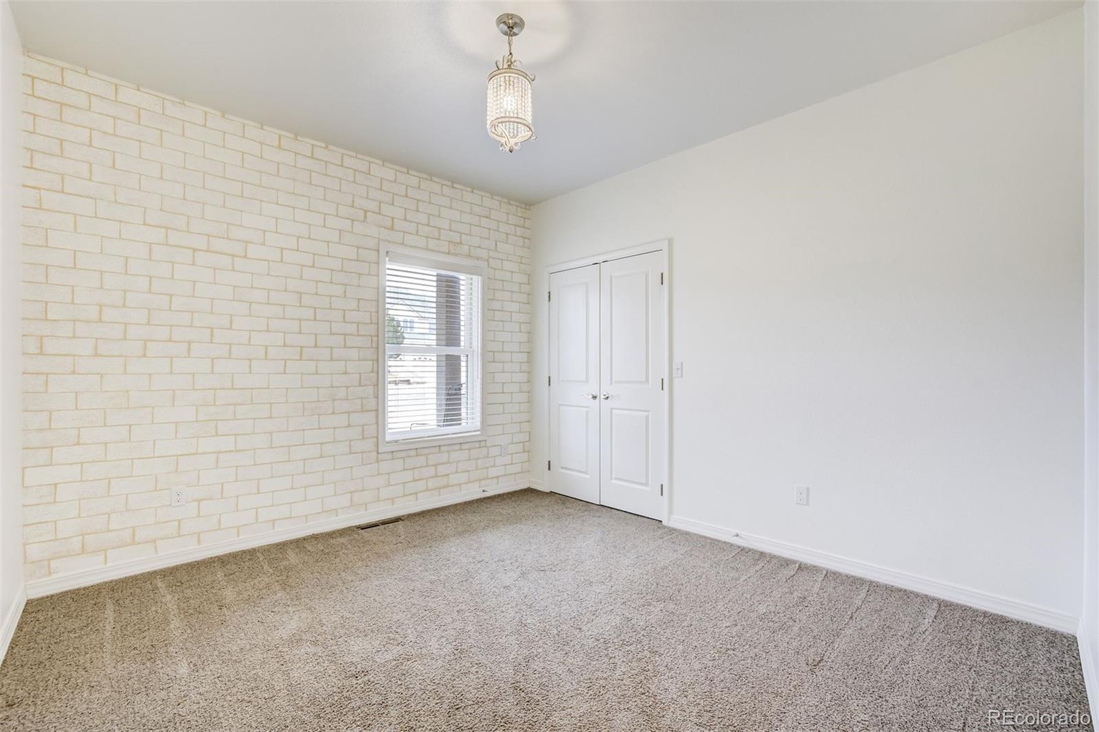 675 9th Street Limon, CO 80828 - Photo 33 of 49 a view of an empty room with a window