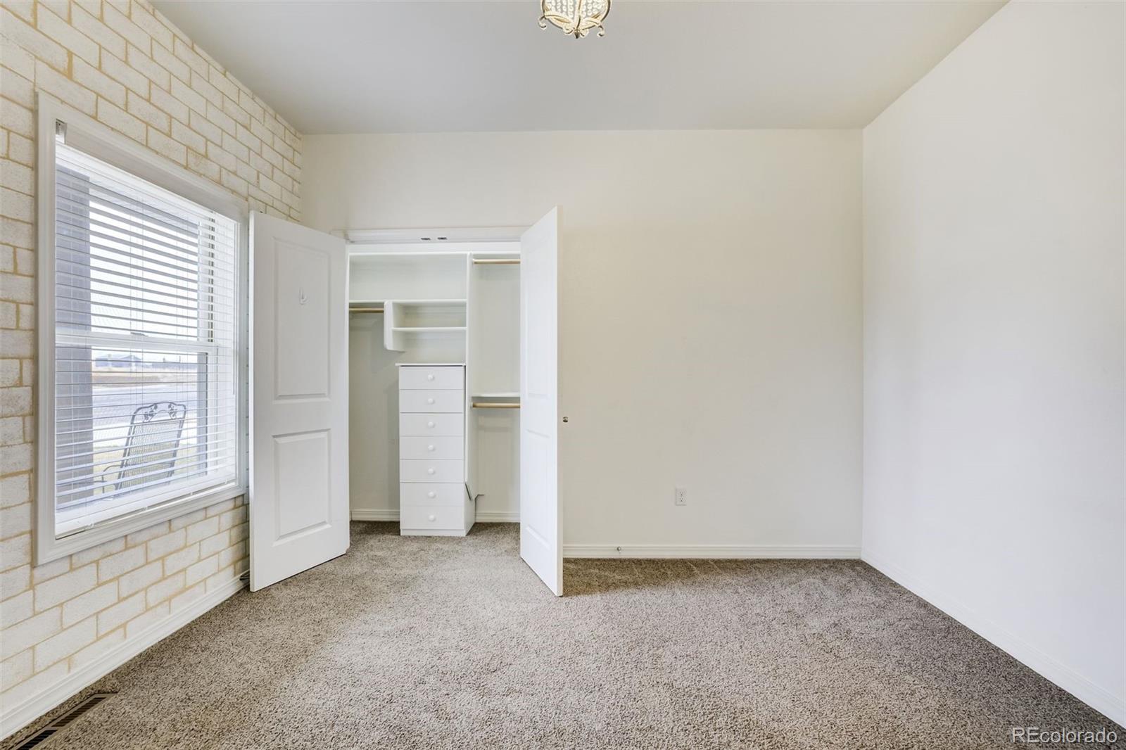 675 9th Street Limon, CO 80828 - Photo 34 of 49 an empty room with windows