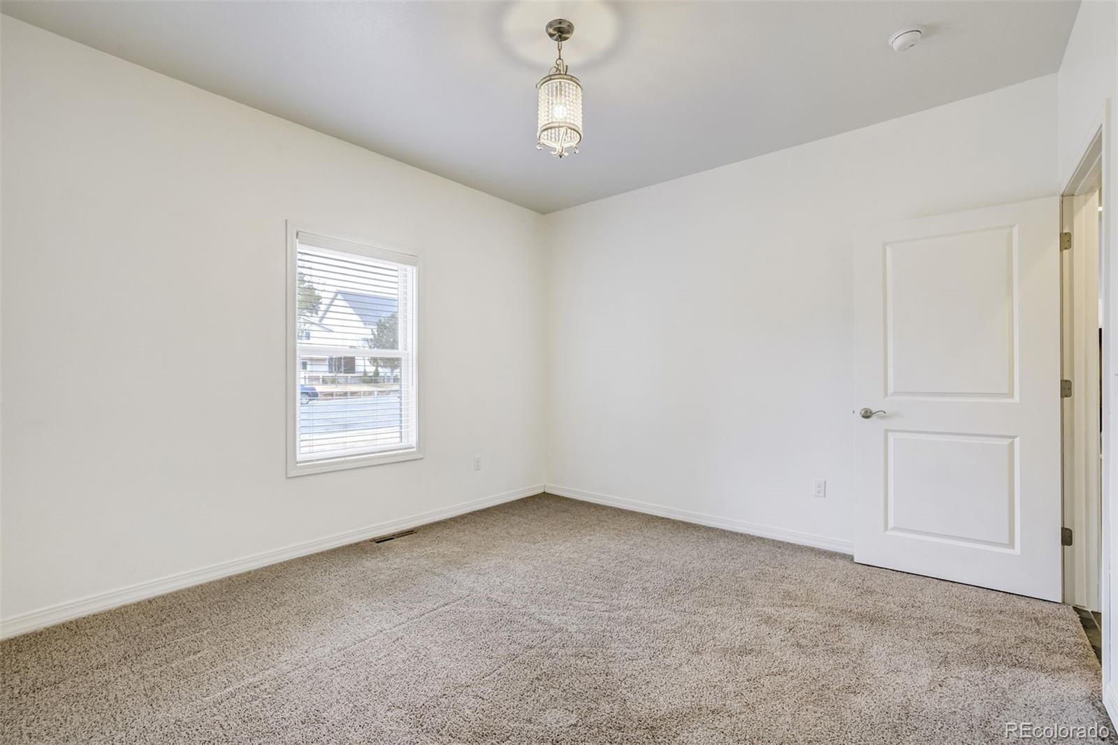 675 9th Street Limon, CO 80828 - Photo 36 of 49 a view of an empty room with a window