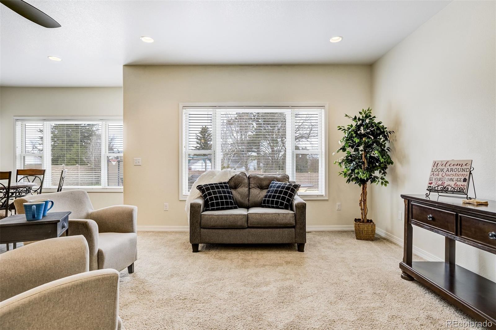 675 9th Street Limon, CO 80828 - Photo 39 of 49 a living room with furniture and a large window