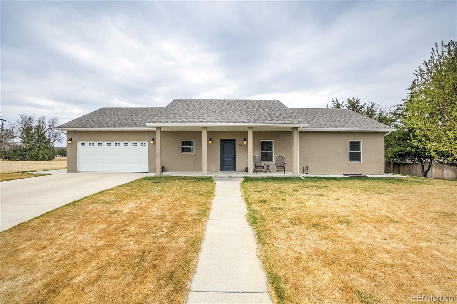 675 9th Street Limon, CO 80828 - Photo 40 of 49 a view of a house with pool and a yard
