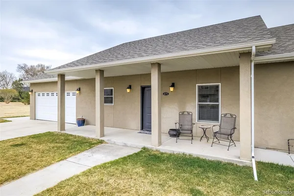 a house view with a garden space