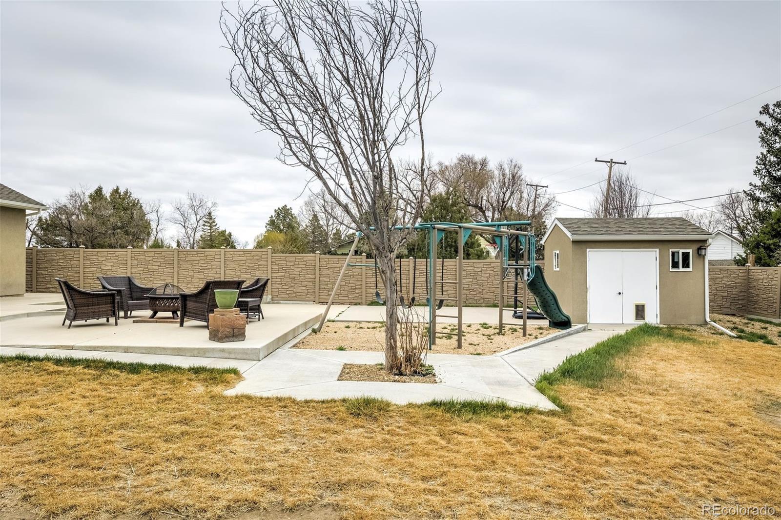 675 9th Street Limon, CO 80828 - Photo 43 of 49 a view of a house with a patio