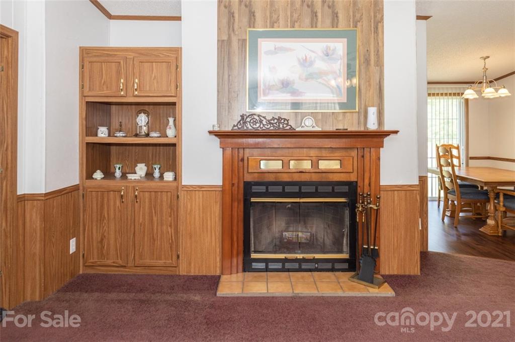 340 Old Bridge Road Rocky Point, NC 28457 - Photo 11 of 35 a living room with a fireplace