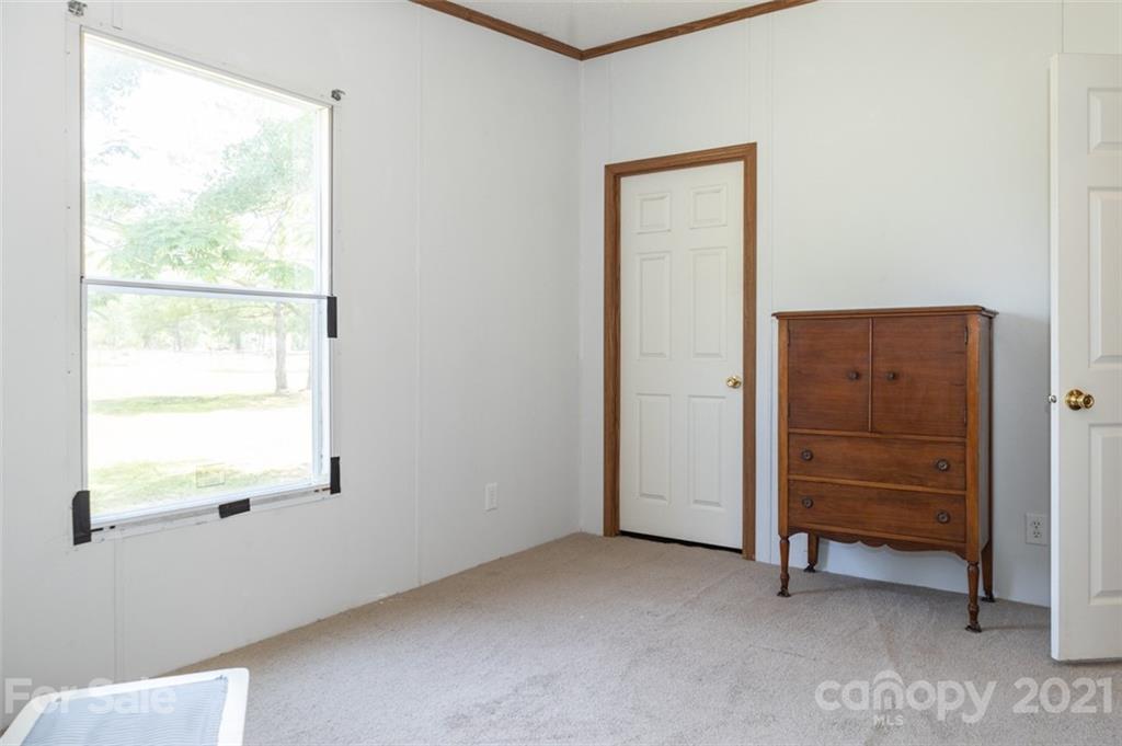 340 Old Bridge Road Rocky Point, NC 28457 - Photo 25 of 35 a view of an empty room with a window