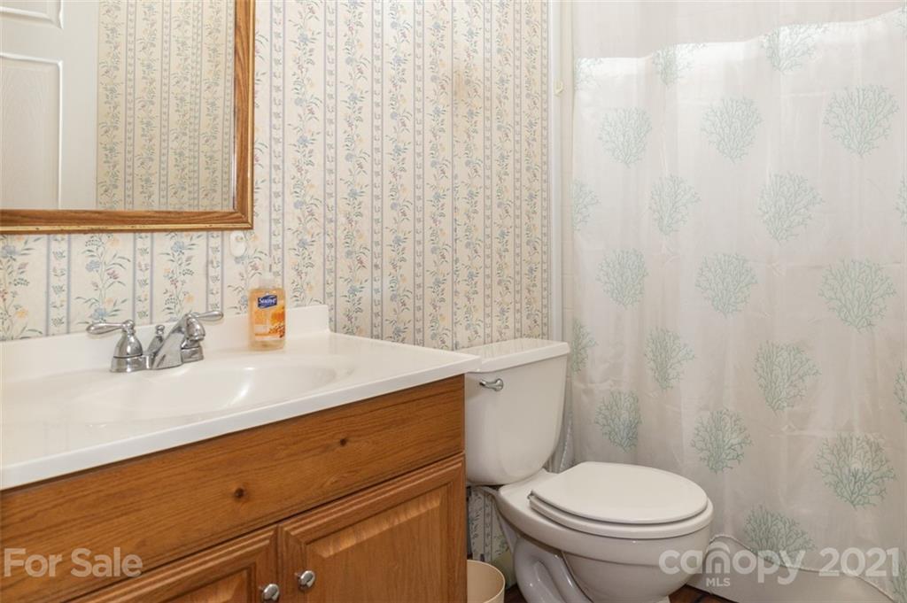 340 Old Bridge Road Rocky Point, NC 28457 - Photo 26 of 35 a bathroom with a sink and a toilet