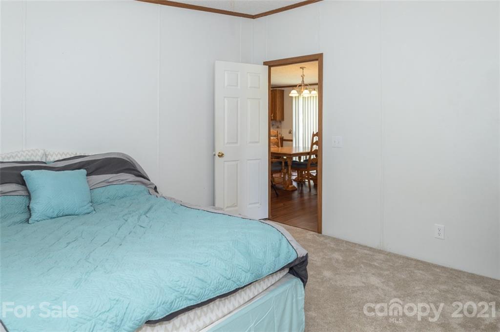 340 Old Bridge Road Rocky Point, NC 28457 - Photo 28 of 35 a bedroom with a bed and a window