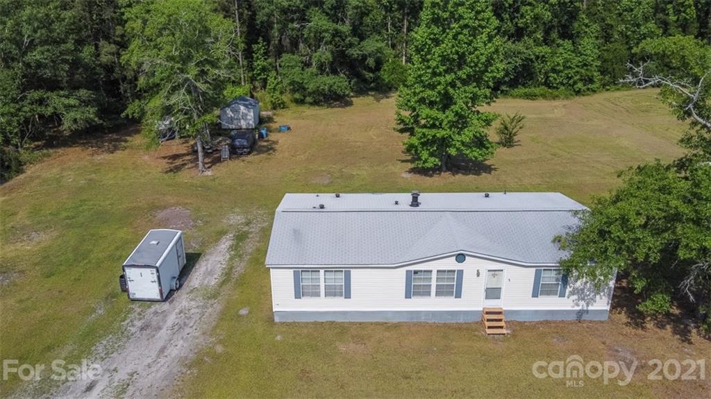 340 Old Bridge Road Rocky Point, NC 28457 - Photo 35 of 35 an aerial view of a house with lake view