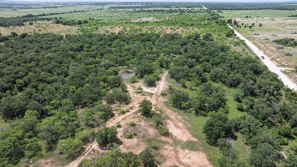268 County Road 268 Rising Star, TX 76471 - Photo 11 of 15 an aerial view of a houses with a yard