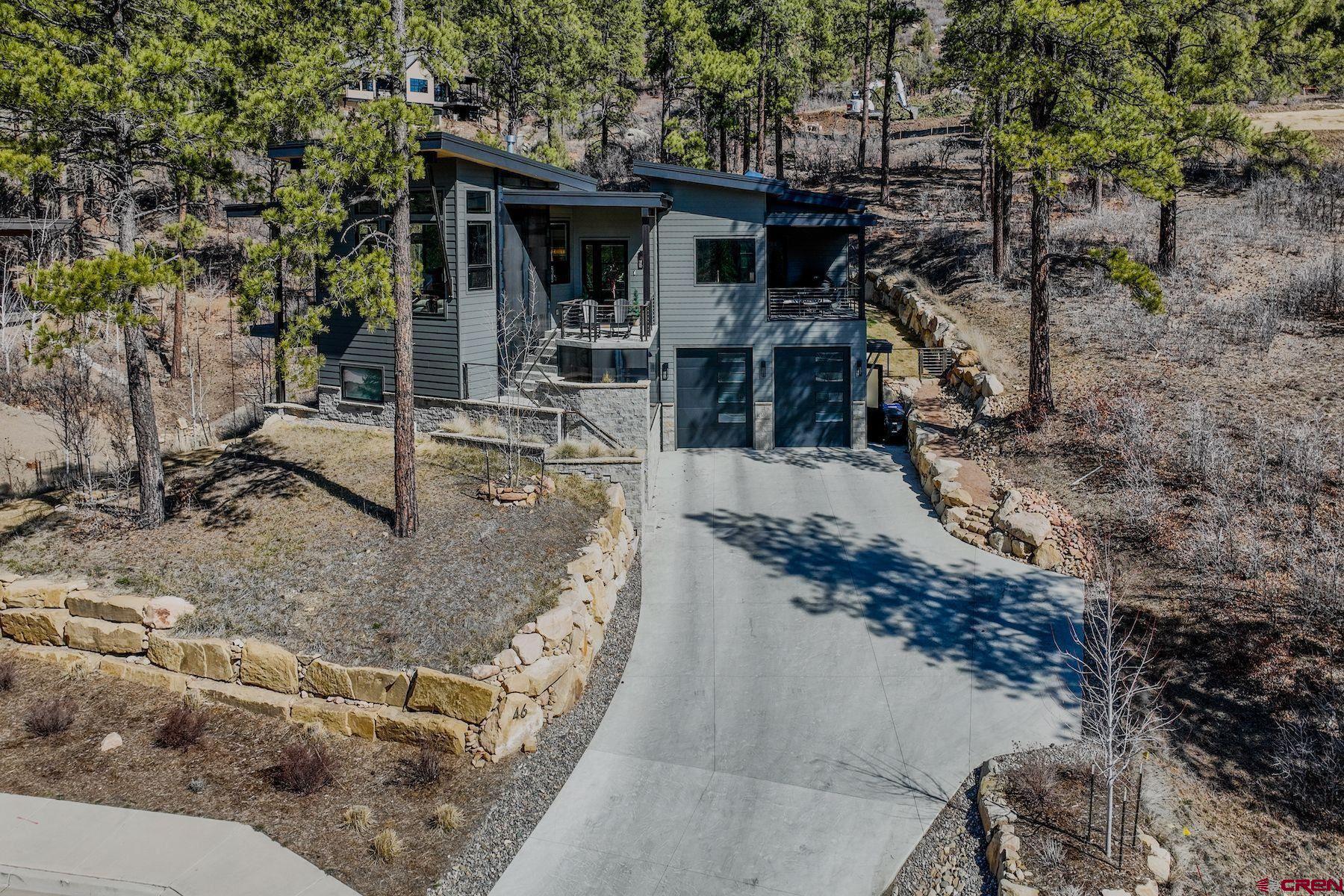 46 Bell Flower Court Durango, CO 81301 - Photo 37 of 40 a view of a house with a yard