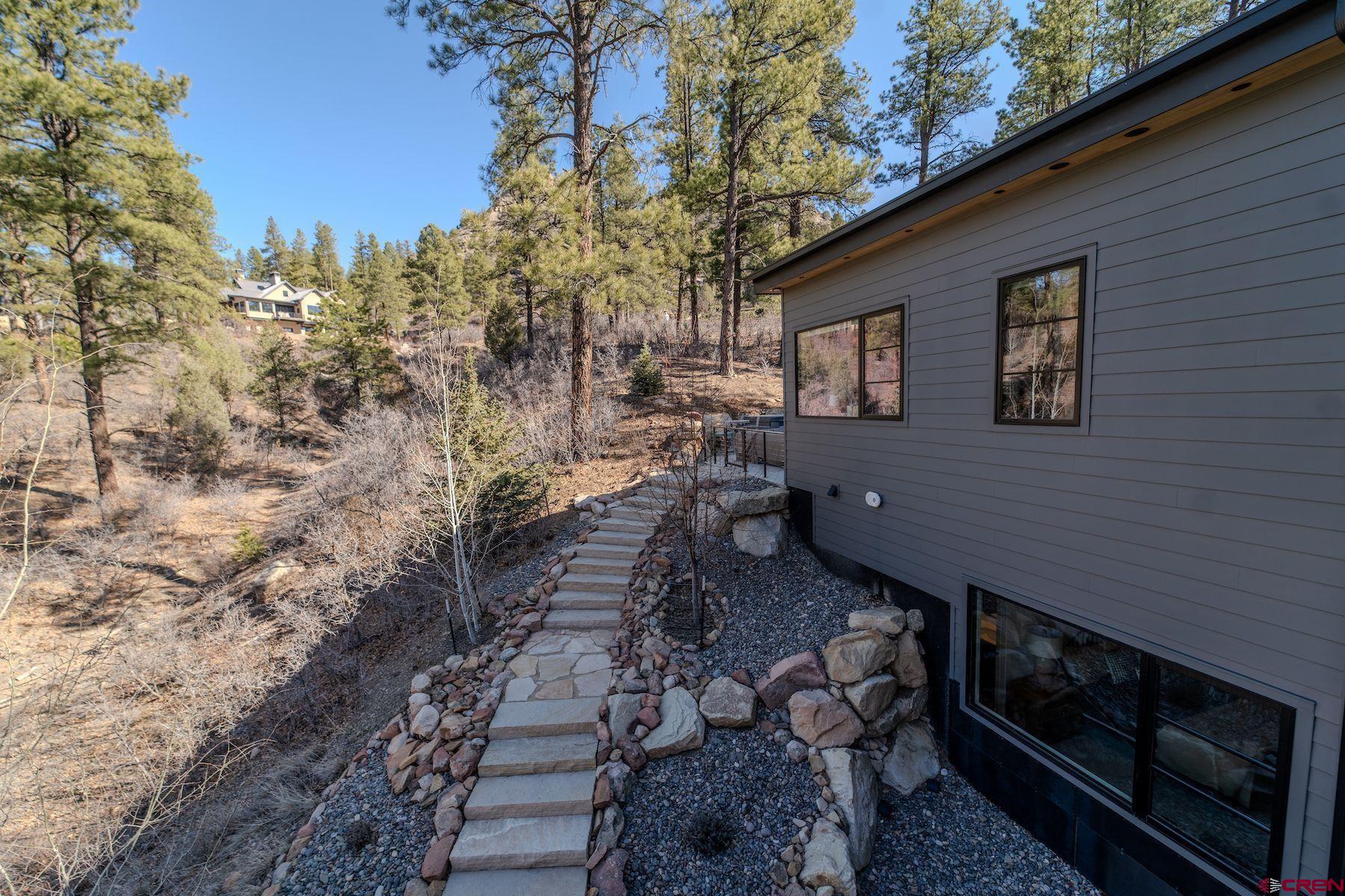 46 Bell Flower Court Durango, CO 81301 - Photo 39 of 40 a view of a backyard with sitting area