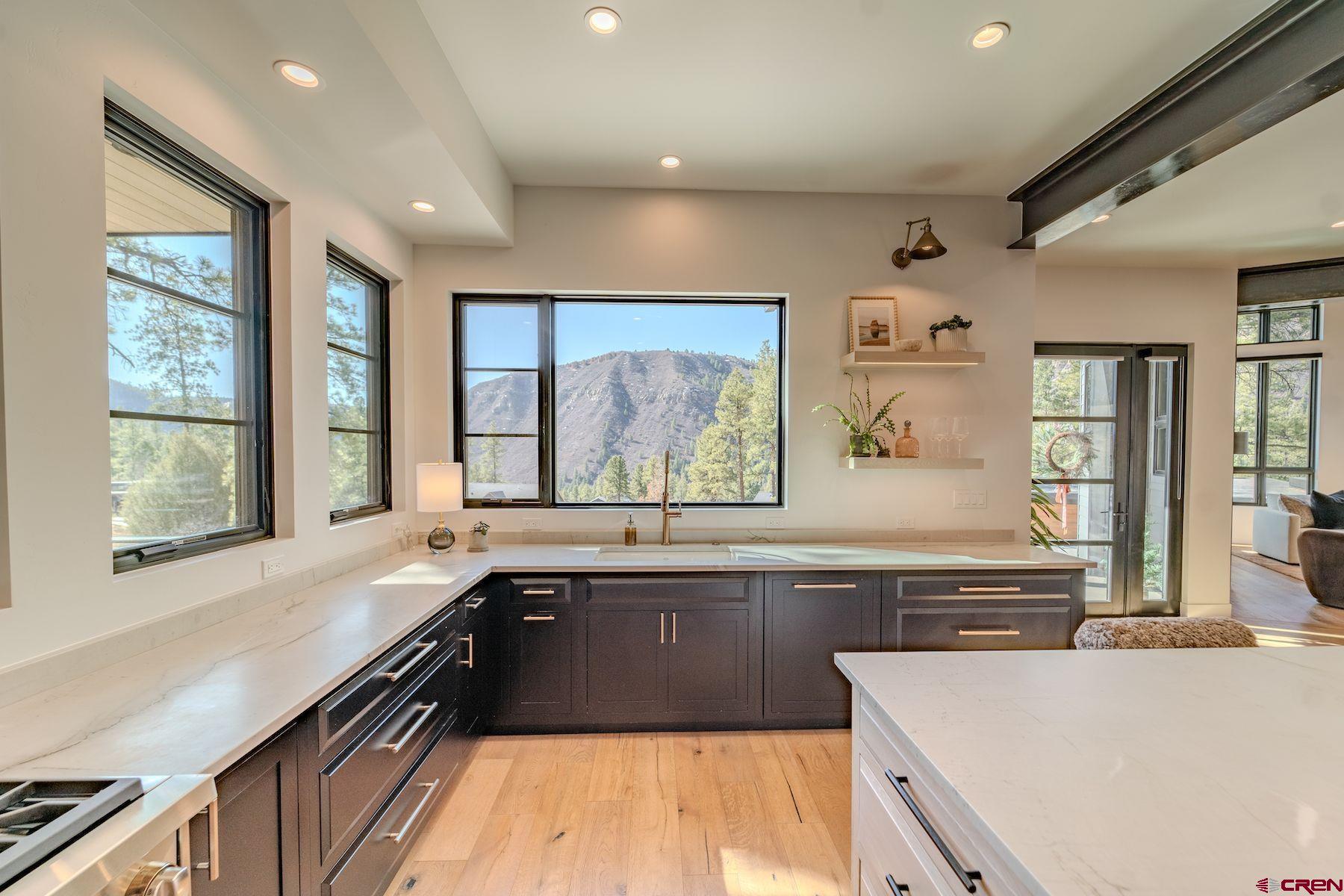 46 Bell Flower Court Durango, CO 81301 - Photo 7 of 40 a large kitchen with granite countertop a large window