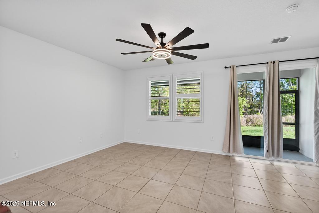 45 Seaport Breeze Road St. Augustine, FL 32095 - Photo 31 of 88 a view of an empty room with a window