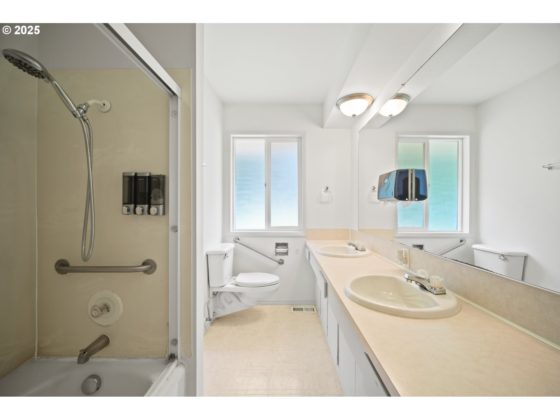 1339 Southwest 27th Court Gresham, OR 97080 - Photo 12 of 41 a bathroom with a sink double vanity granite tub shower and a mirror