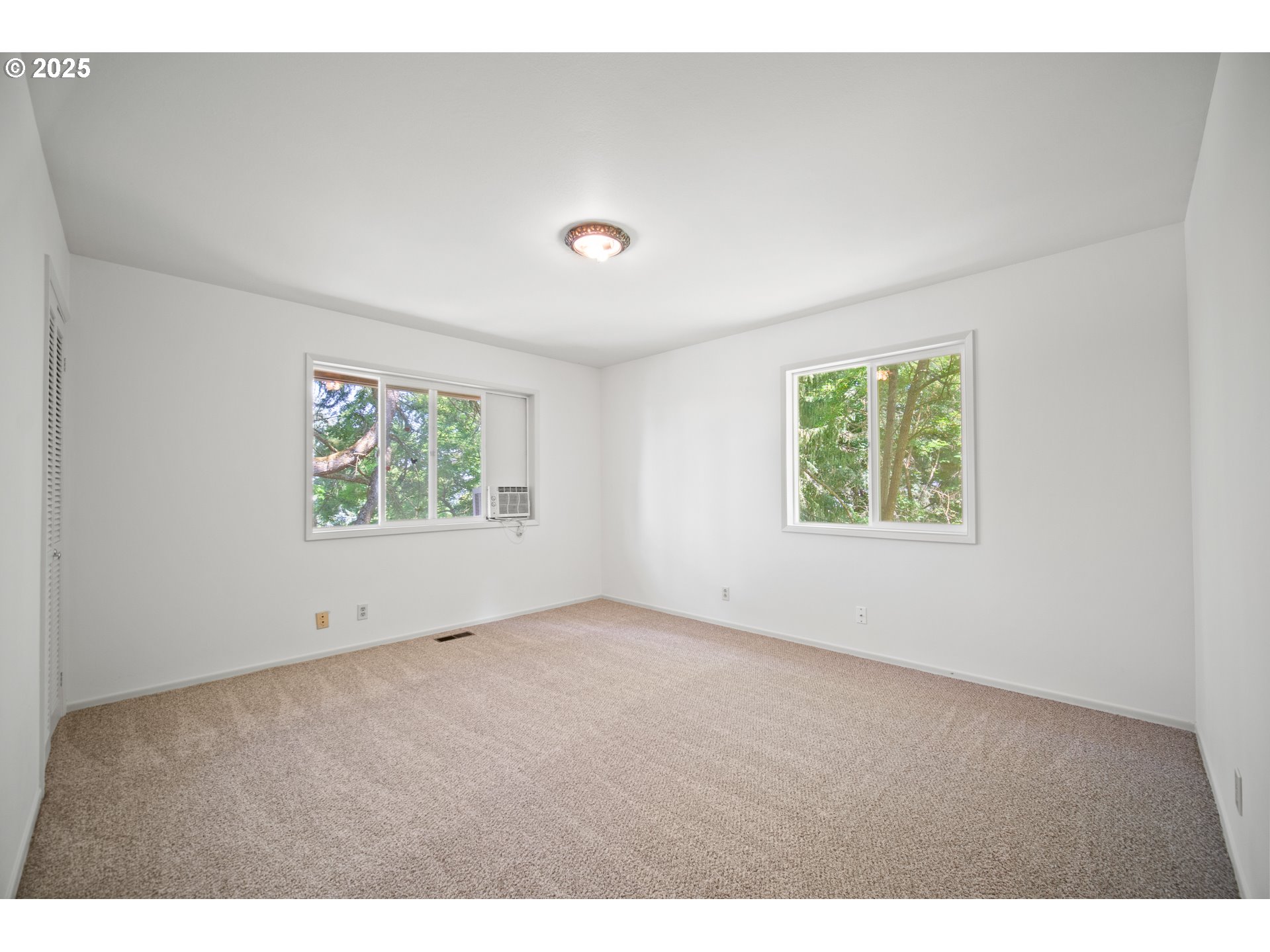 1339 Southwest 27th Court Gresham, OR 97080 - Photo 13 of 41 an empty room with windows