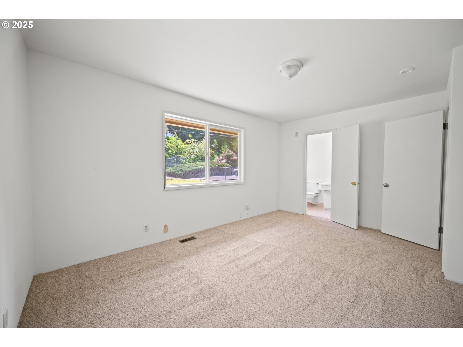 1339 Southwest 27th Court Gresham, OR 97080 - Photo 14 of 41 a view of an empty room with a window