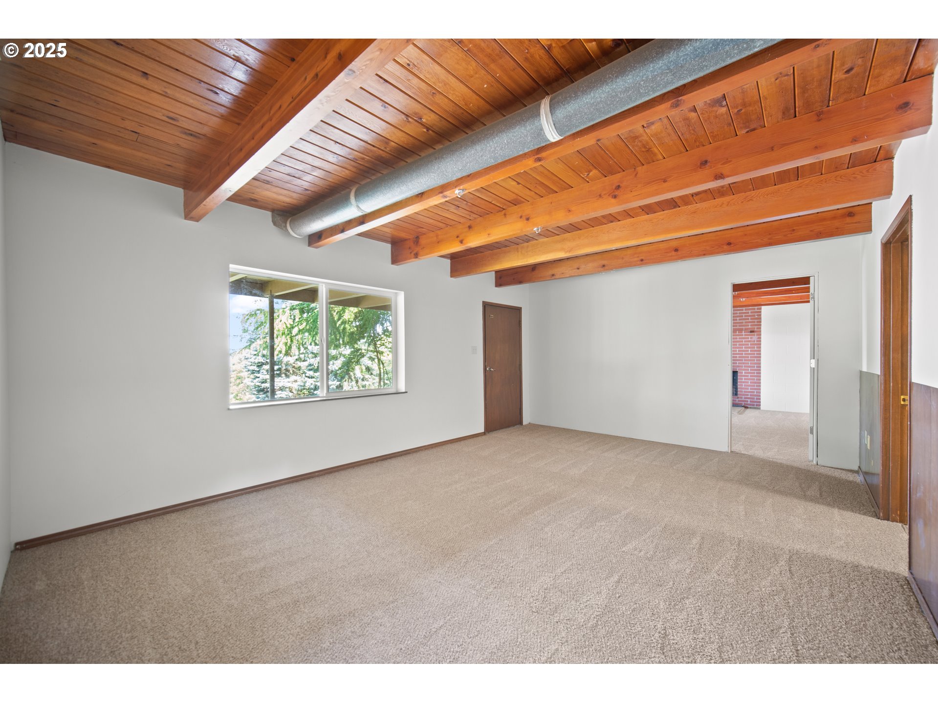1339 Southwest 27th Court Gresham, OR 97080 - Photo 16 of 41 a view of an empty room with a window