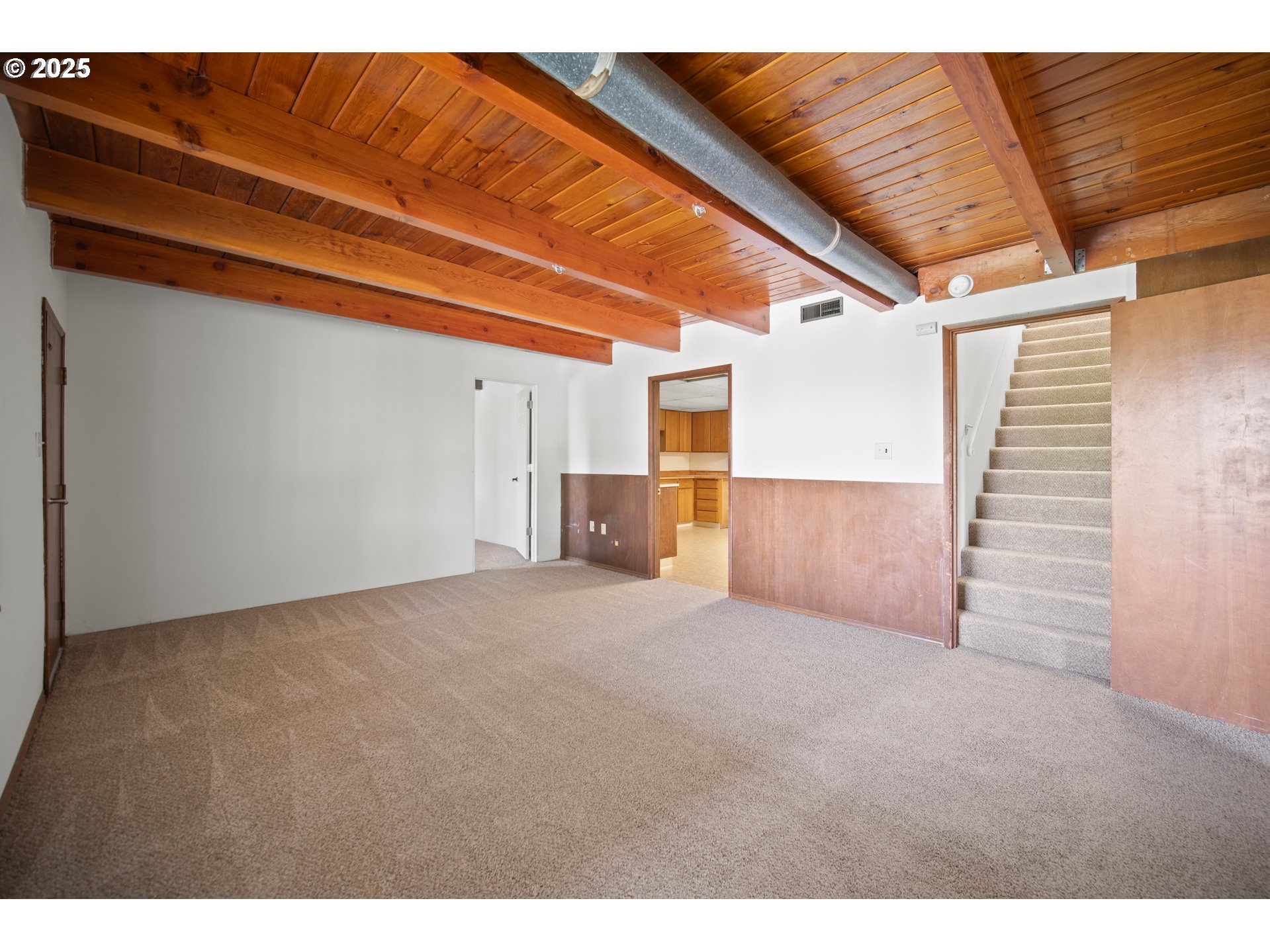 1339 Southwest 27th Court Gresham, OR 97080 - Photo 18 of 41 a view of a livingroom with a ceiling fan