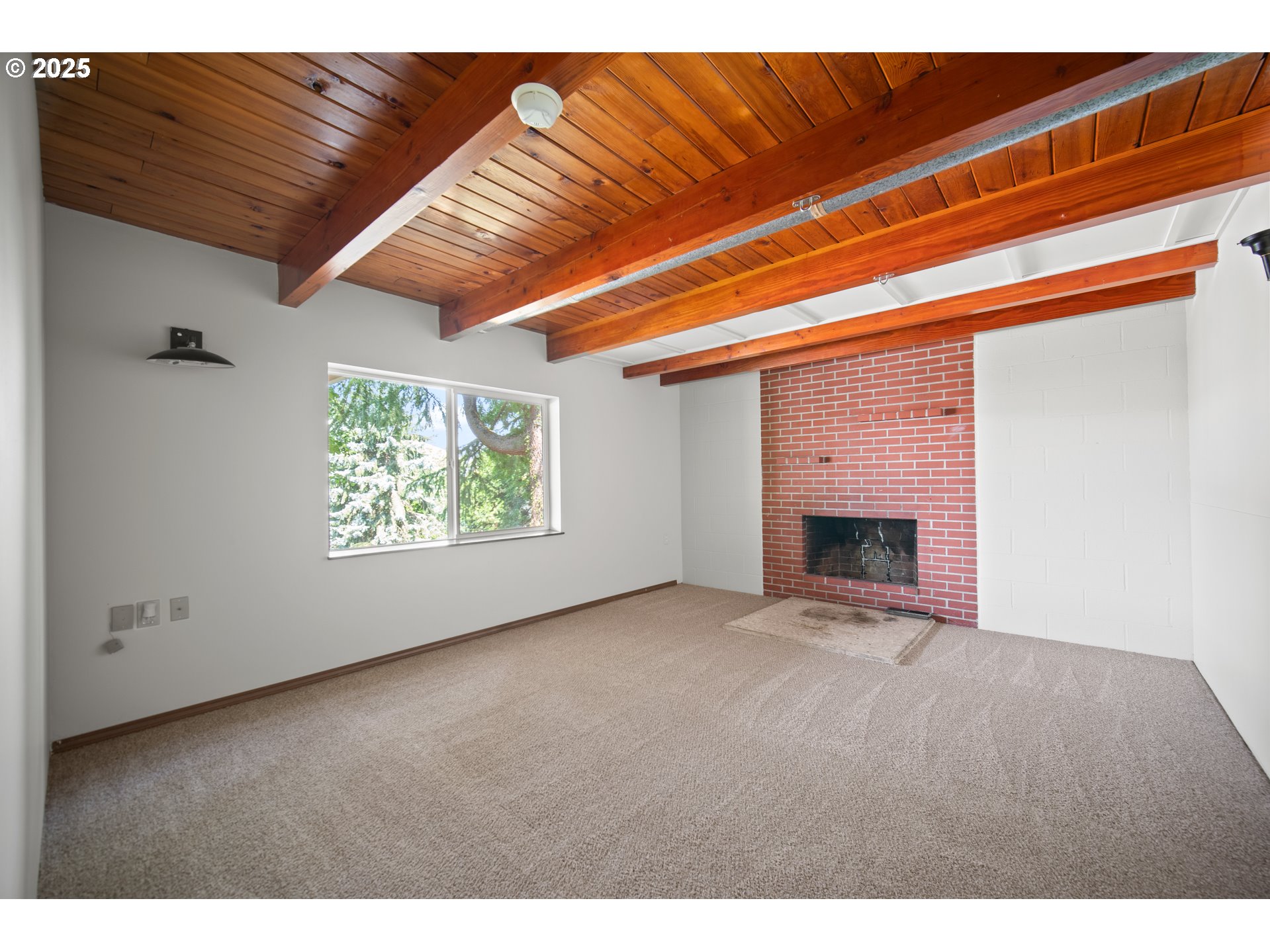 1339 Southwest 27th Court Gresham, OR 97080 - Photo 19 of 41 a view of empty room with a fireplace