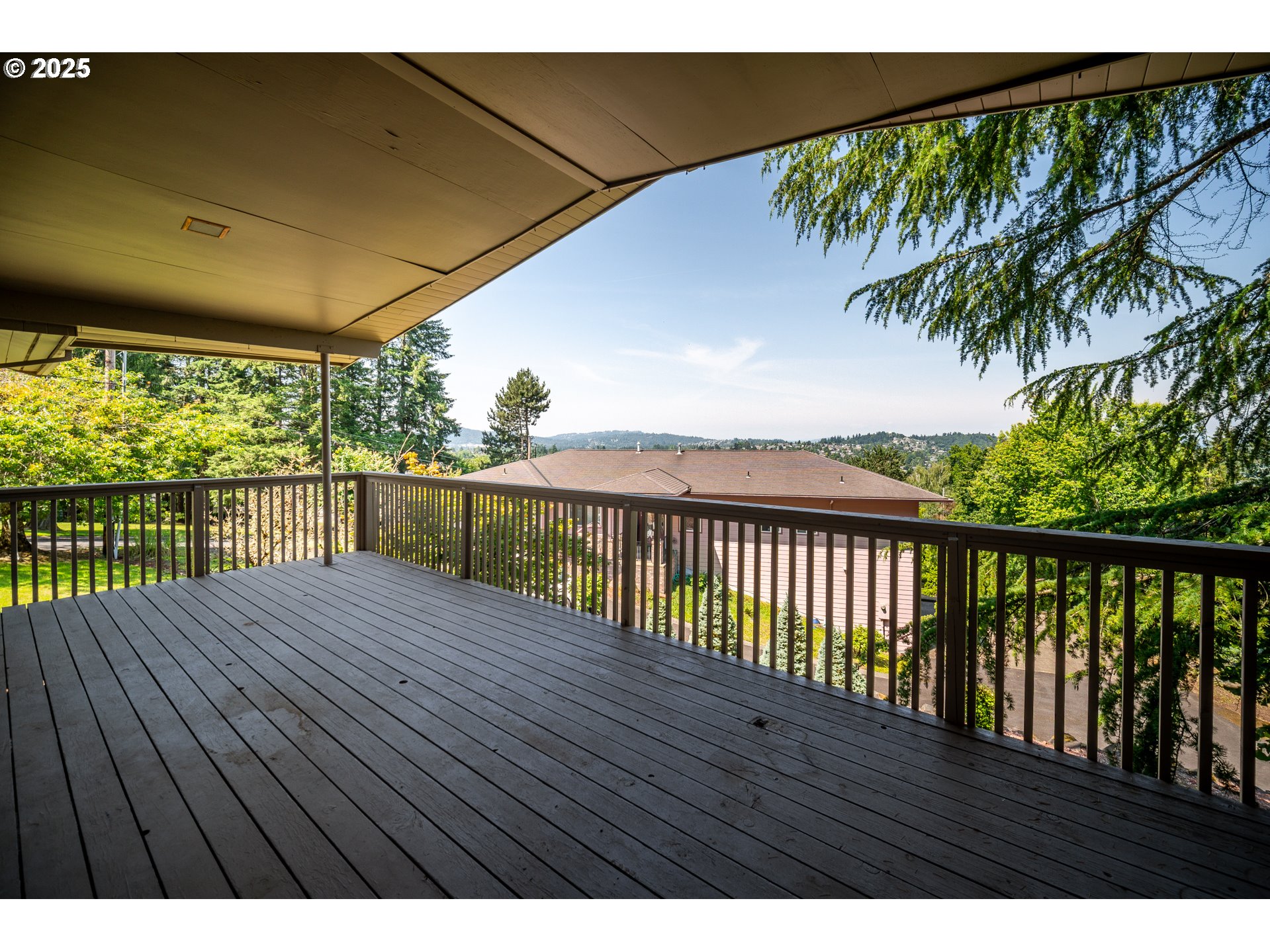 1339 Southwest 27th Court Gresham, OR 97080 - Photo 2 of 41 a view of balcony with wooden floor