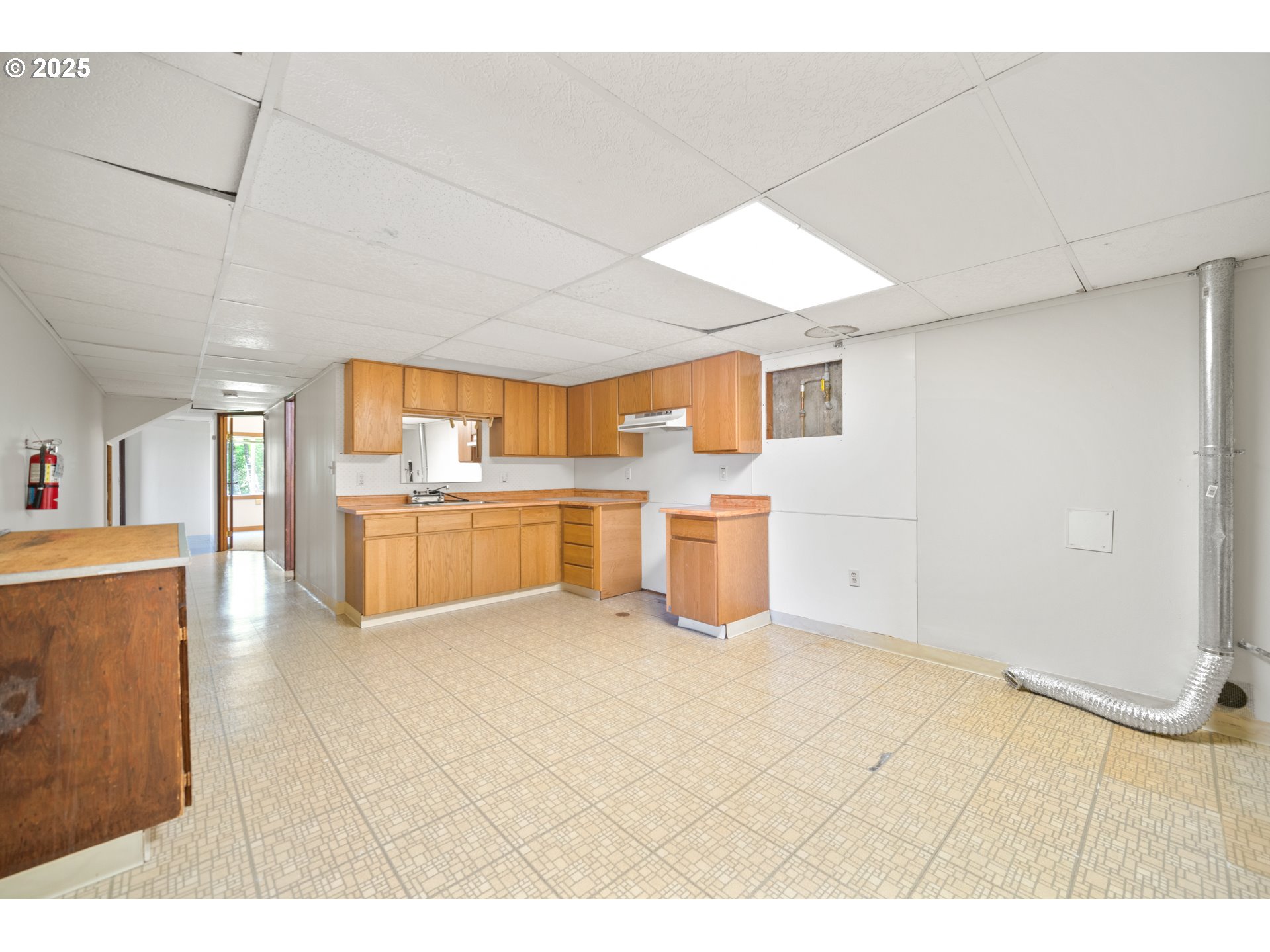 1339 Southwest 27th Court Gresham, OR 97080 - Photo 21 of 41 a view of kitchen with furniture and wooden floor
