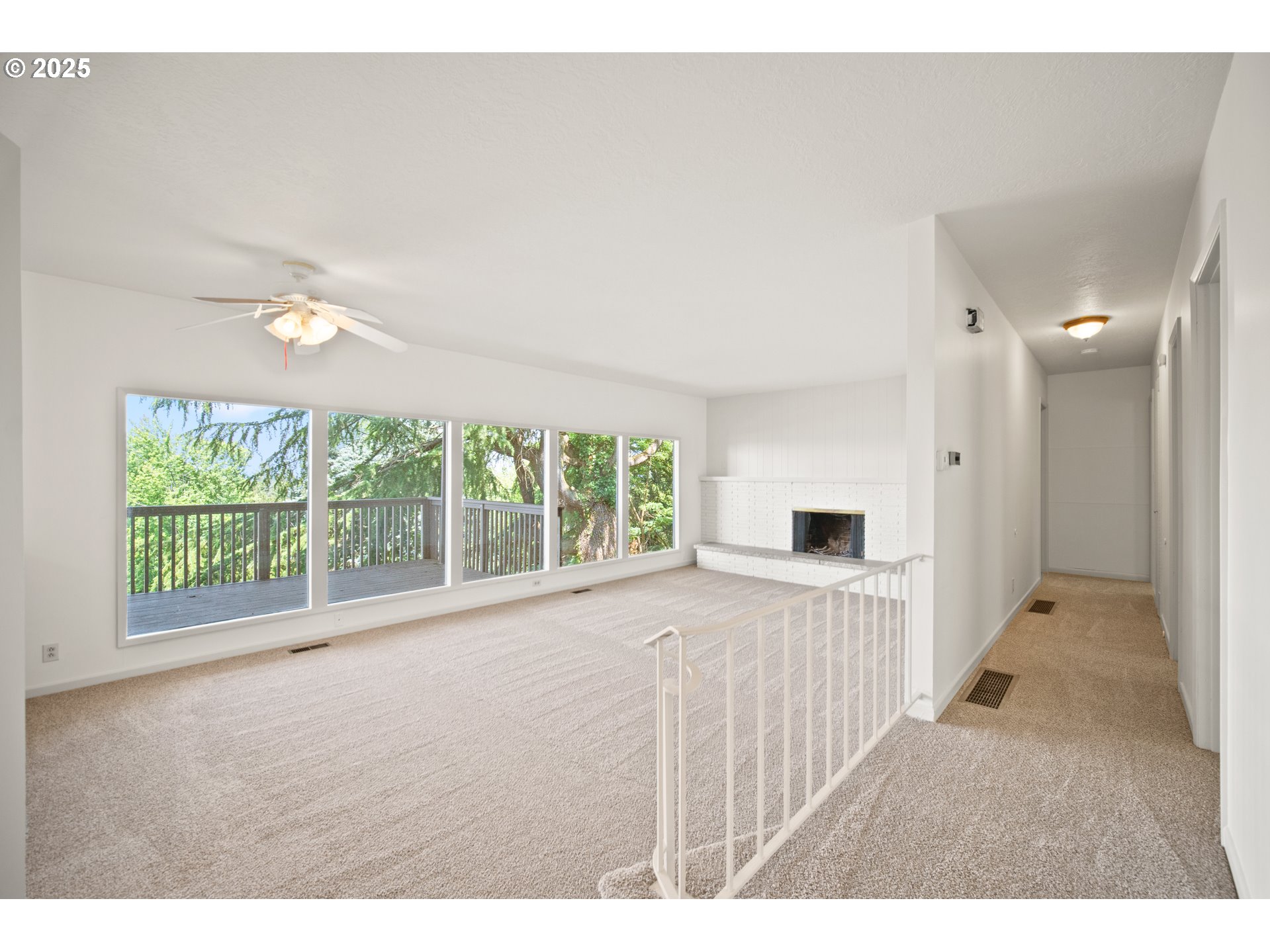 1339 Southwest 27th Court Gresham, OR 97080 - Photo 30 of 41 a view of a livingroom with wooden floor and a fireplace