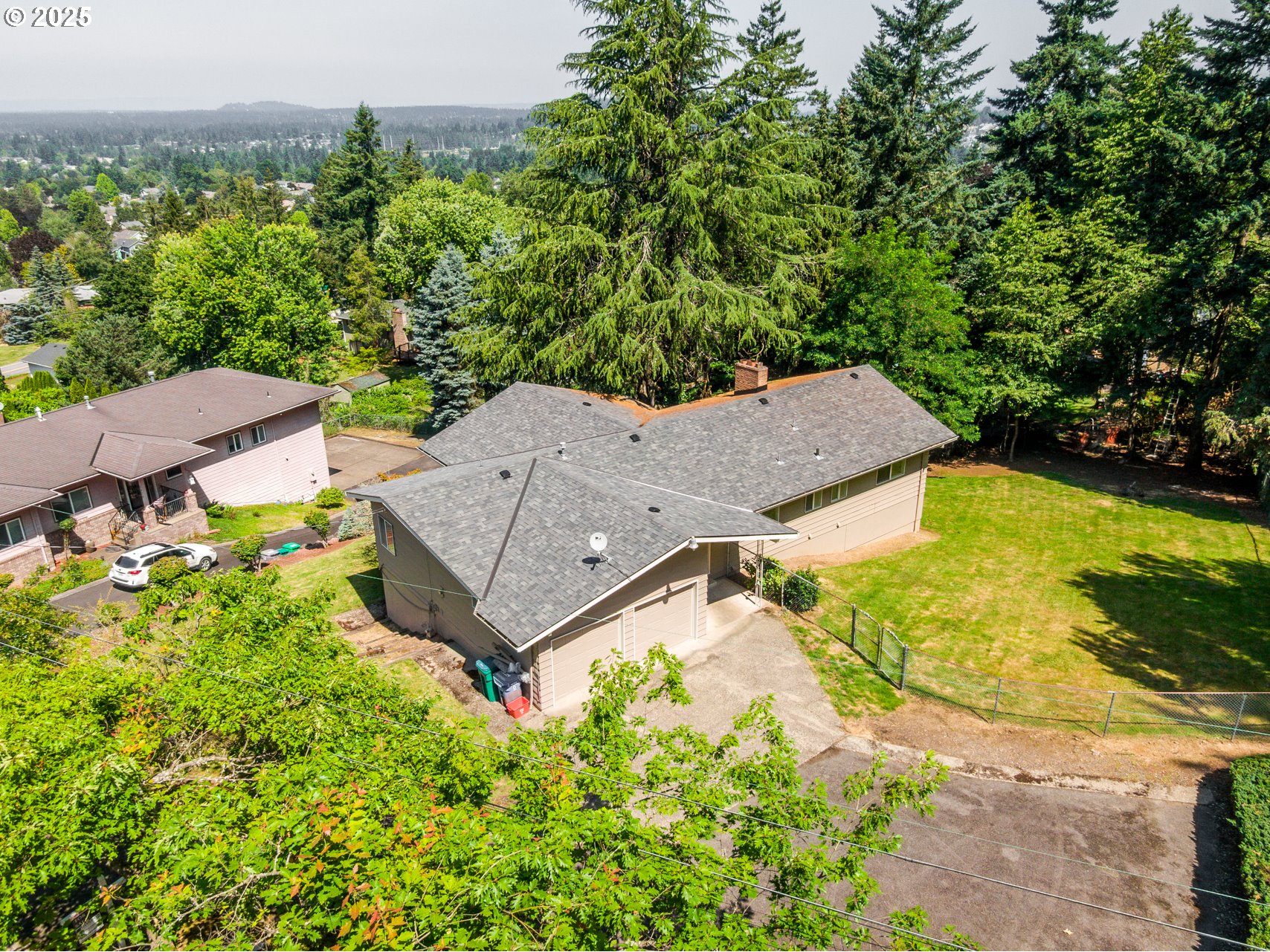 1339 Southwest 27th Court Gresham, OR 97080 - Photo 3 of 41 an aerial view of a house with a garden and mountains
