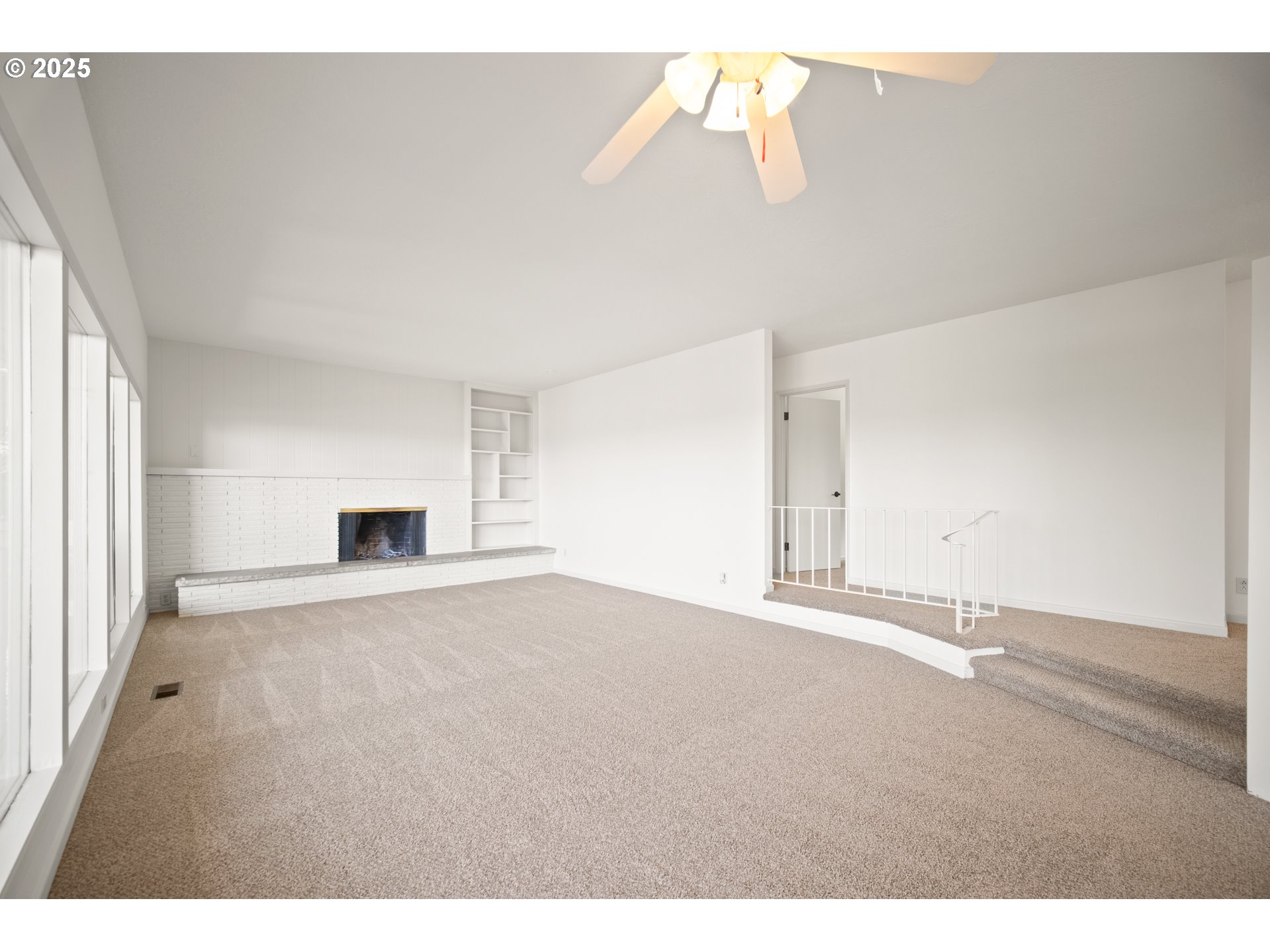 1339 Southwest 27th Court Gresham, OR 97080 - Photo 31 of 41 a view of empty room with wooden floor and fan
