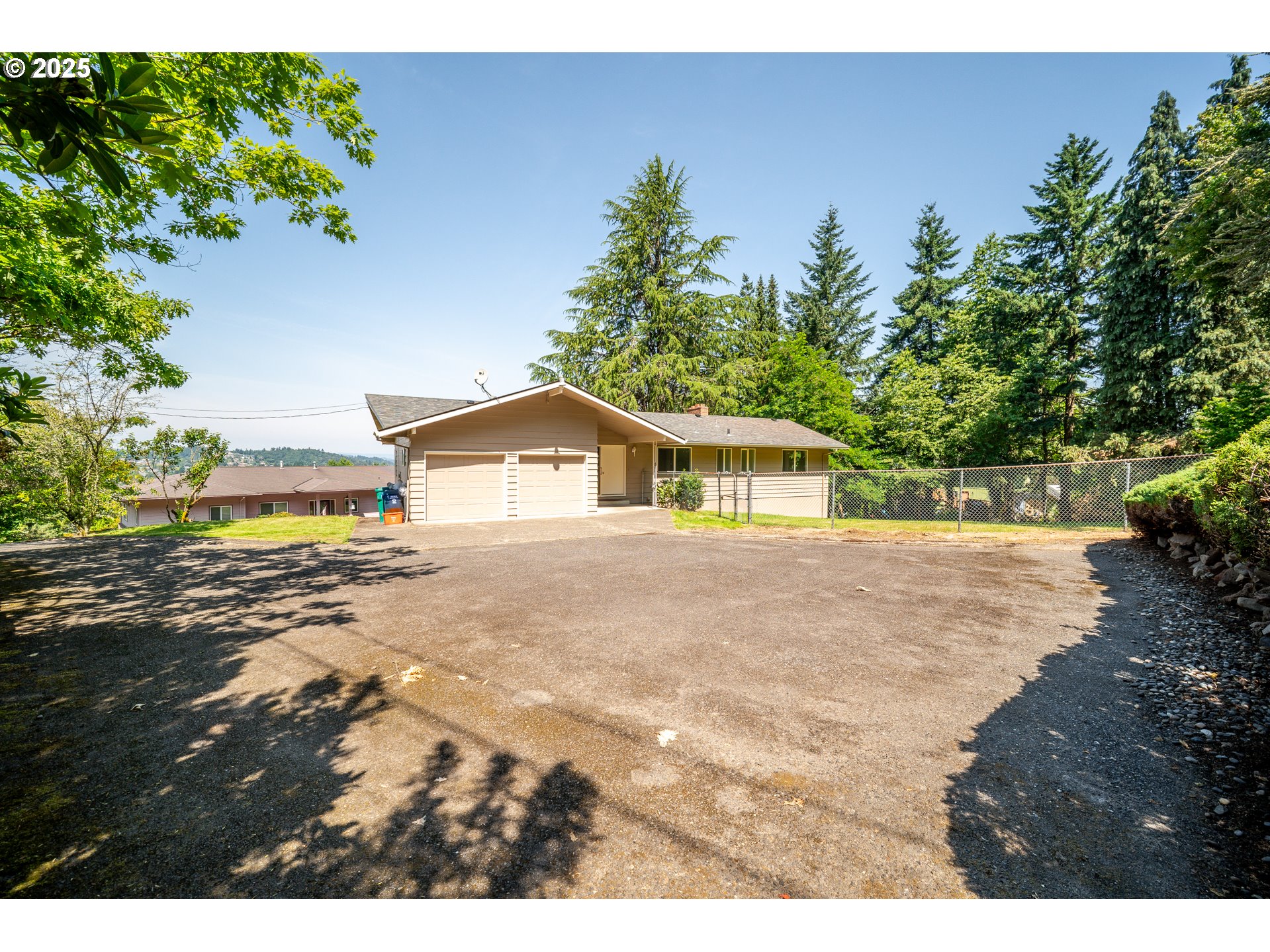 1339 Southwest 27th Court Gresham, OR 97080 - Photo 35 of 41 a front view of a house with a yard and garage