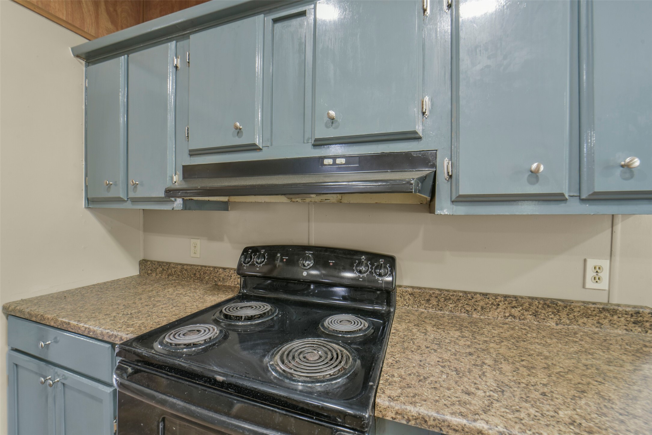 11023 Forrest Valley Drive Houston, TX 77065 - Photo 20 of 47 a stove top oven sitting inside of a kitchen