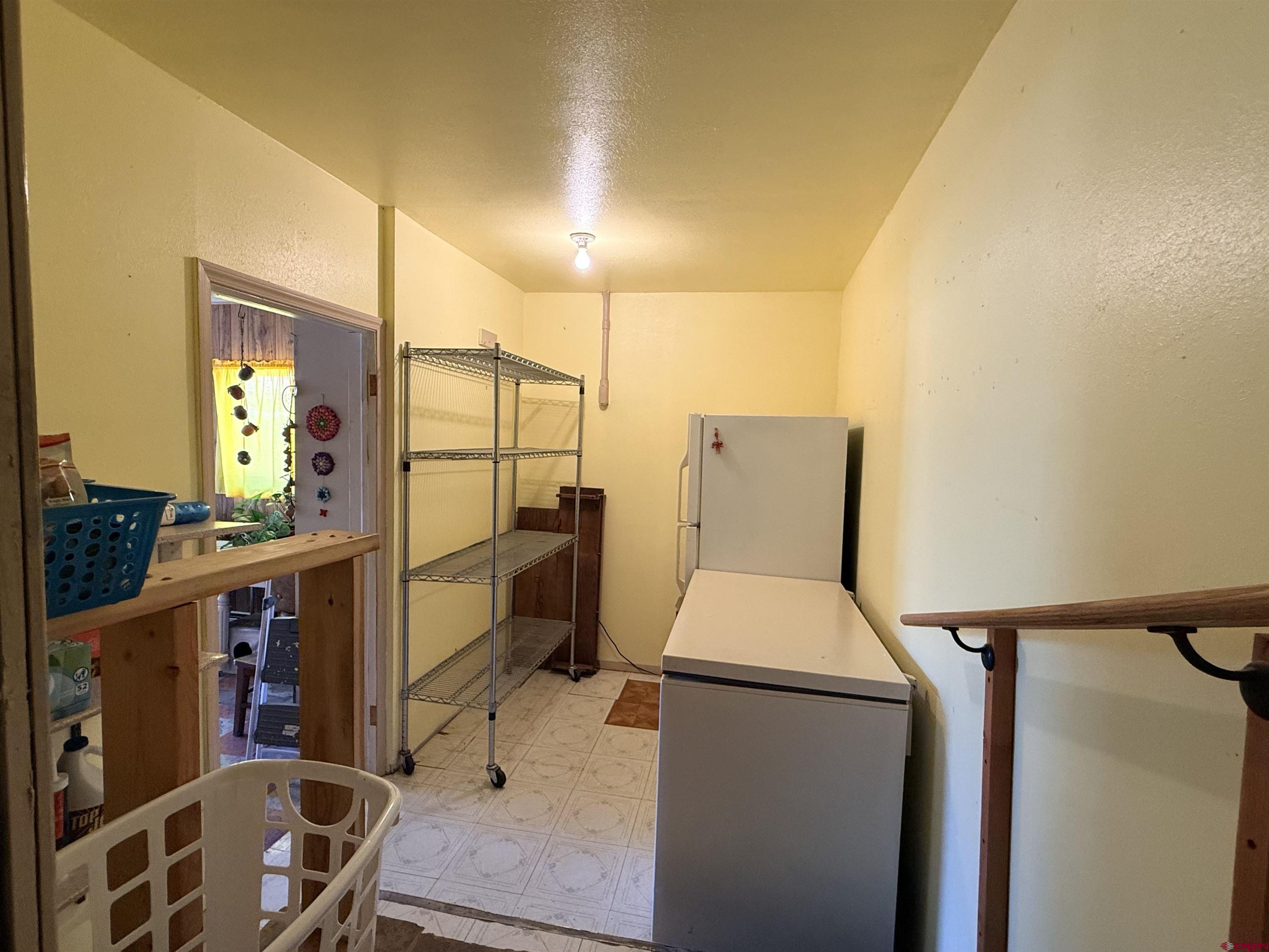 631 A Street Delta, CO 81416 - Photo 13 of 25 a room with storage and utility