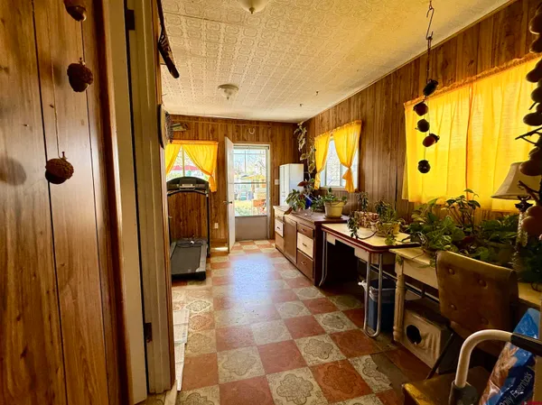 a kitchen with stainless steel appliances granite countertop sink stove top oven and cabinets