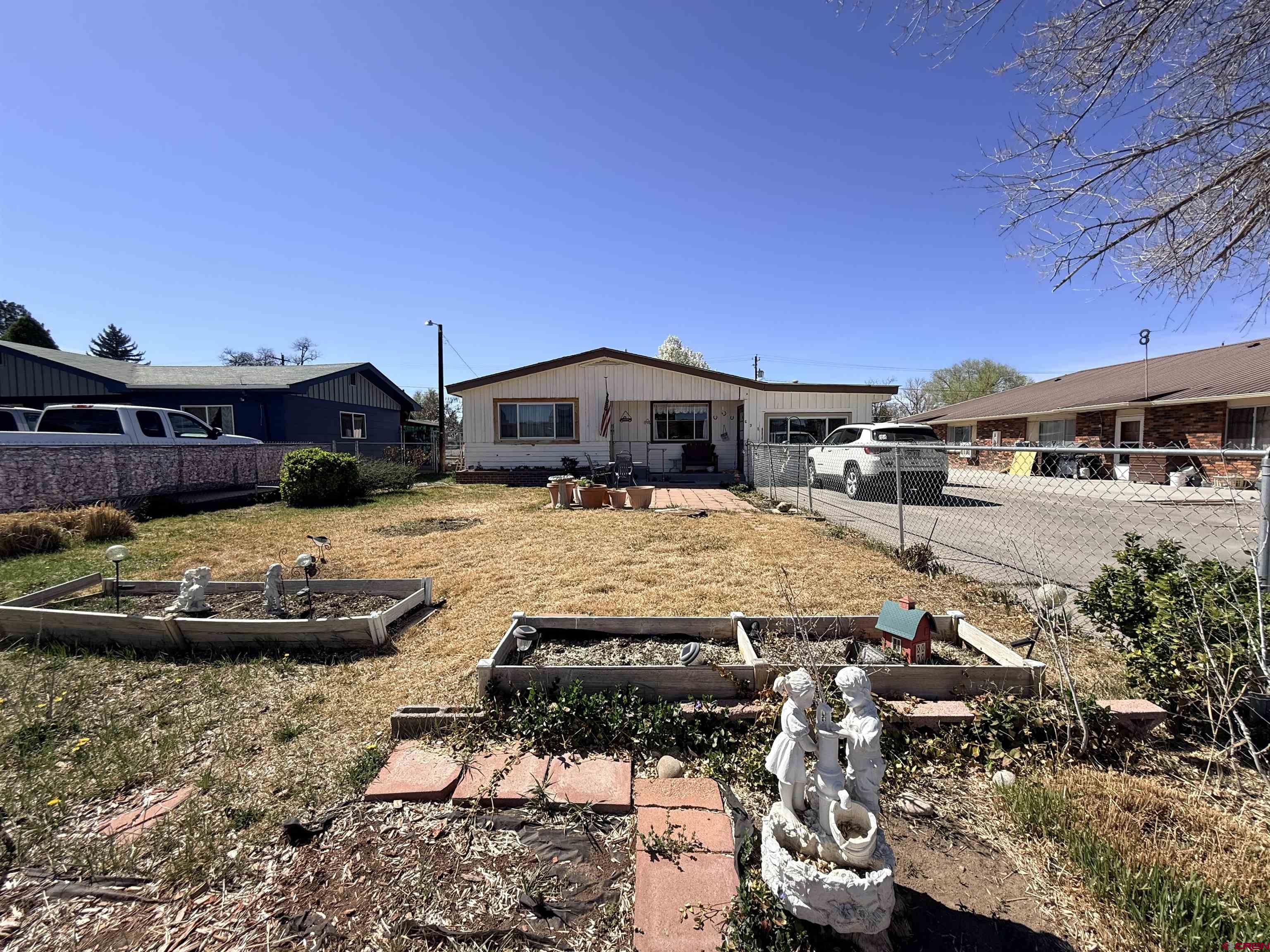 631 A Street Delta, CO 81416 - Photo 2 of 25 a view of a swimming pool with a patio