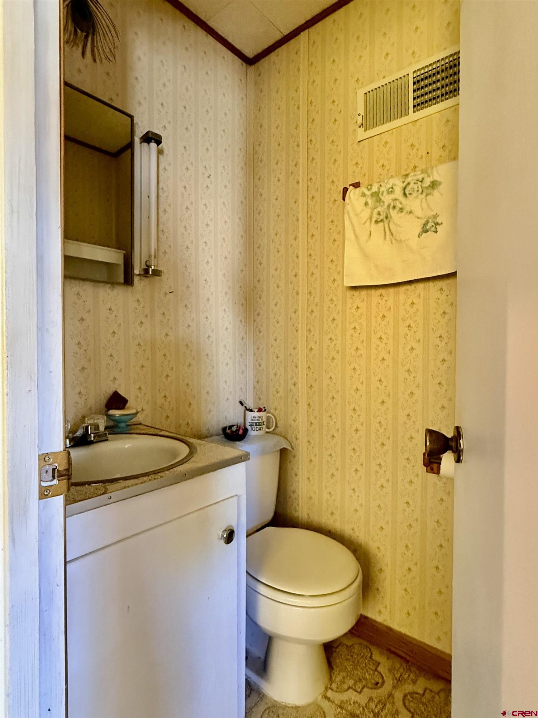 631 A Street Delta, CO 81416 - Photo 25 of 25 a bathroom with a sink and a toilet