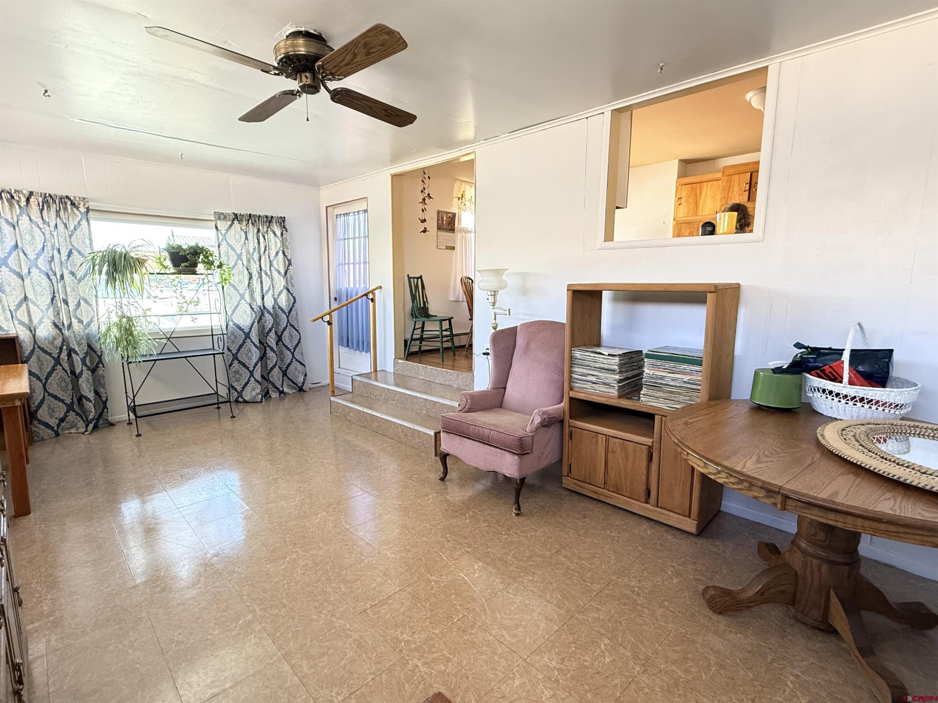 631 A Street Delta, CO 81416 - Photo 9 of 25 a work room with furniture and a wooden floor