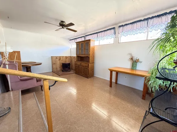 a workspace with furniture and window