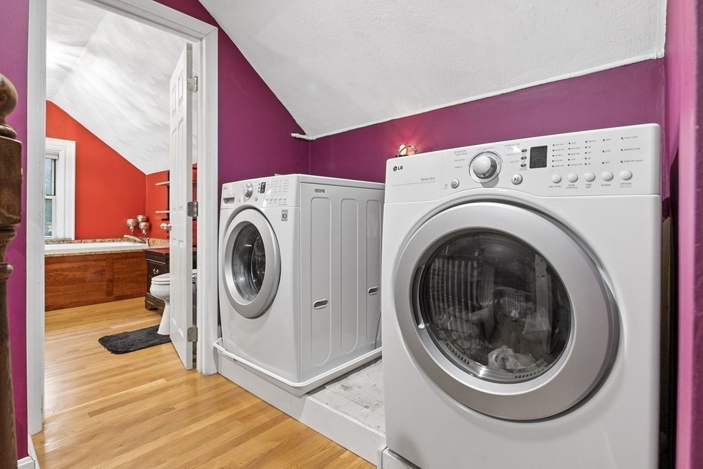 868 Main Street Reading, MA 01867 - Photo 20 of 32 a utility room with dryer and washer