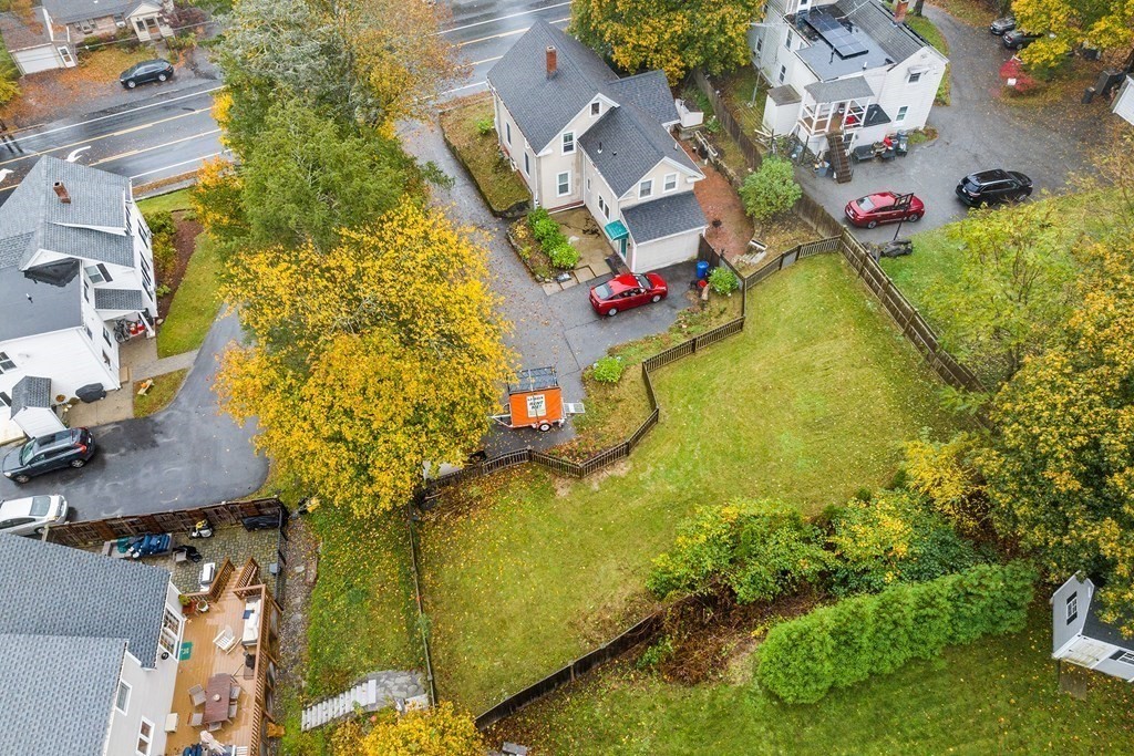 868 Main Street Reading, MA 01867 - Photo 2 of 32 an aerial view of residential house with pool and yard