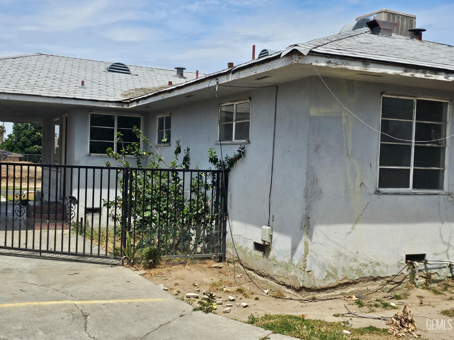 Undisclosed Address Bakersfield, CA 93304 - Photo 3 of 15 a front view of a house