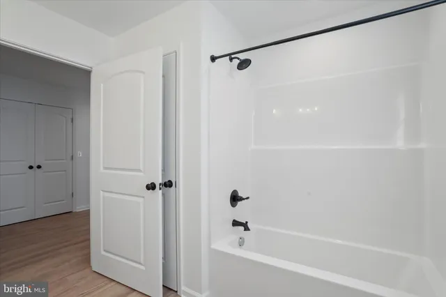 a bathroom with a bathtub