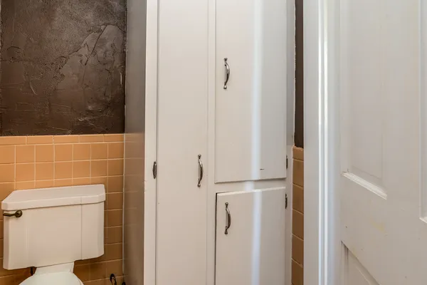 a bathroom with a toilet