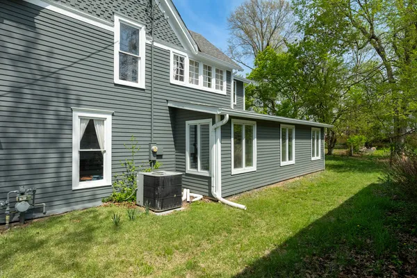 a view of backyard with a garden and plants