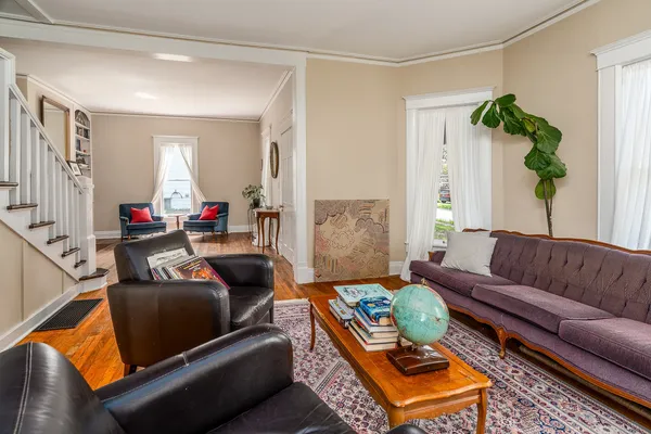 a living room with furniture and a window